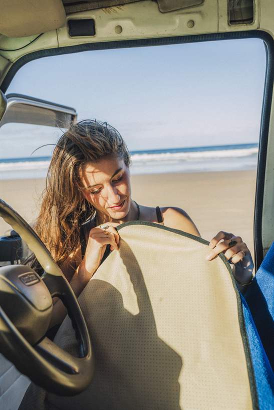 Tuff Towel seat cover at the beach after a surf