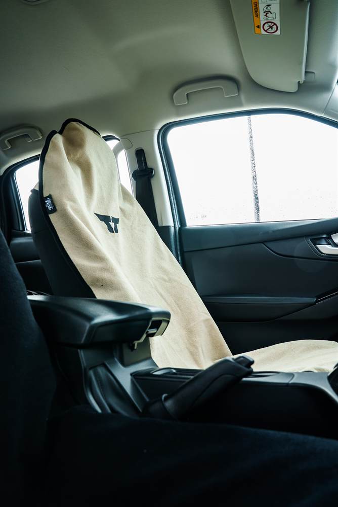 Waterproof front car seat cover in a car